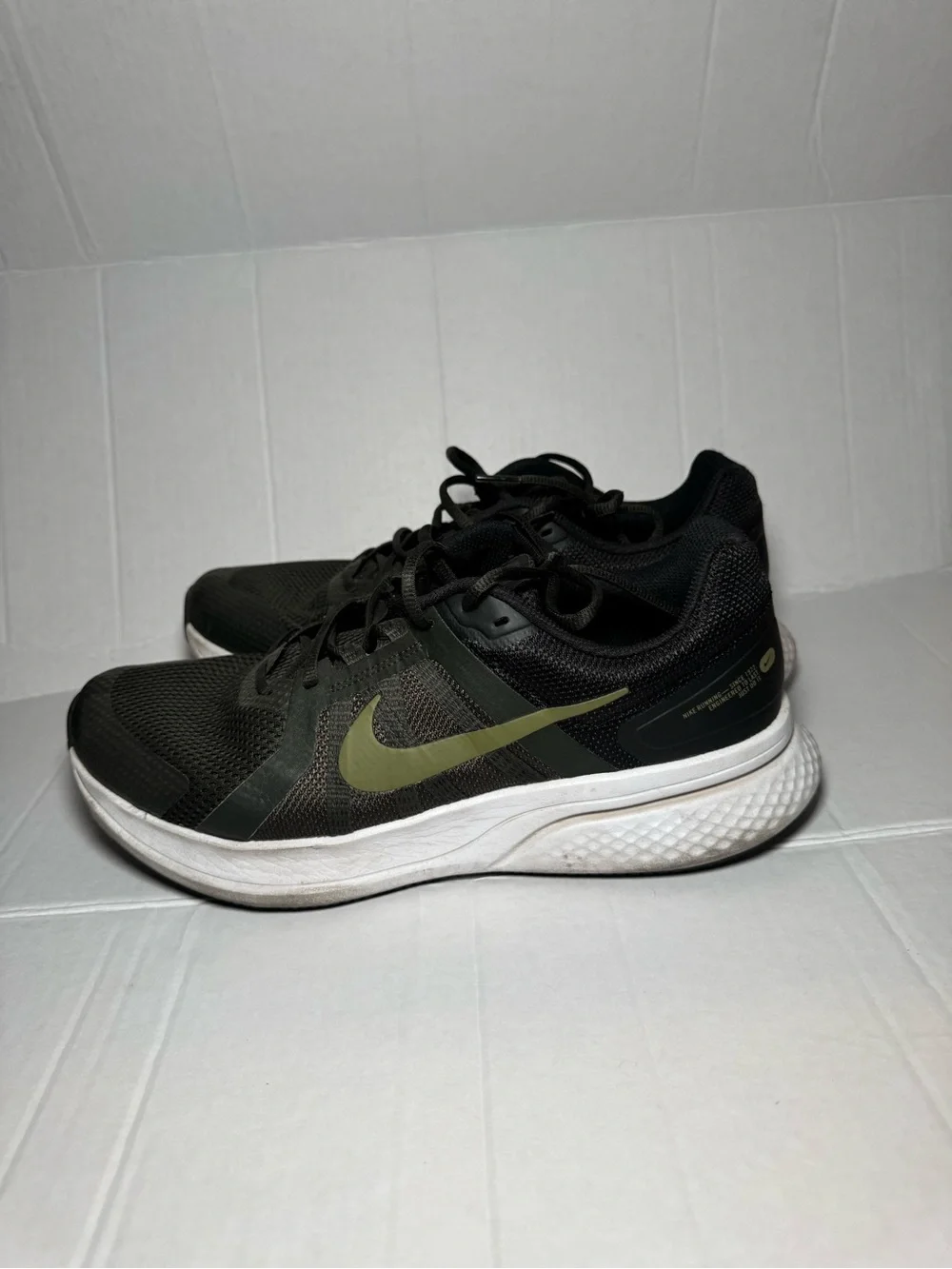 Nike Men’s Black Athletic Shoes with Olive Swoosh